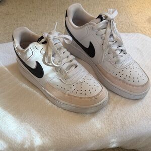 Nike White Low-Top Sneakers with Black Swoosh